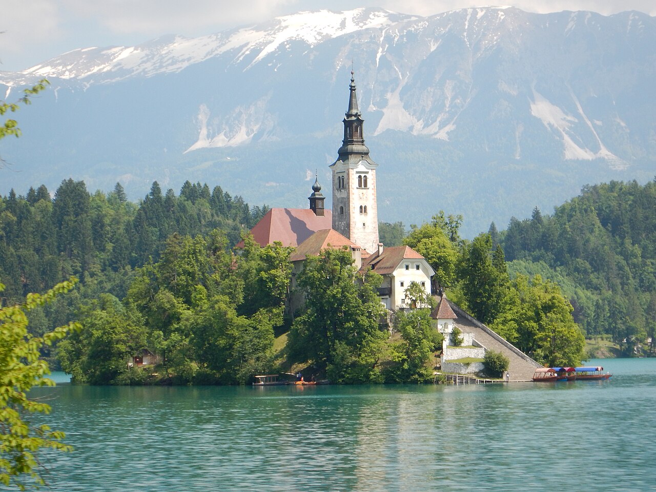 Bled Island church, blue-green lake and mountains